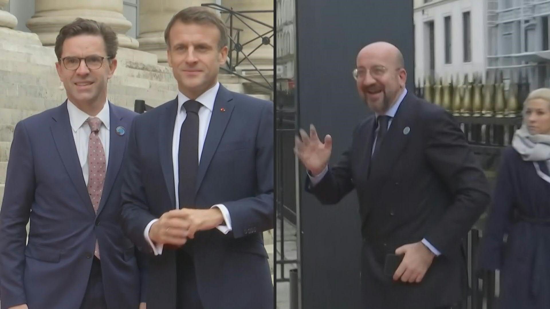 Emmanuel Macron and Charles Michel arrive at Paris Peace Forum