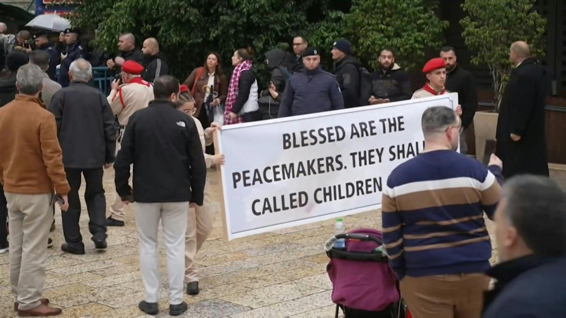 Scouts parade in Bethlehem ahead of Christmas Eve celebrations