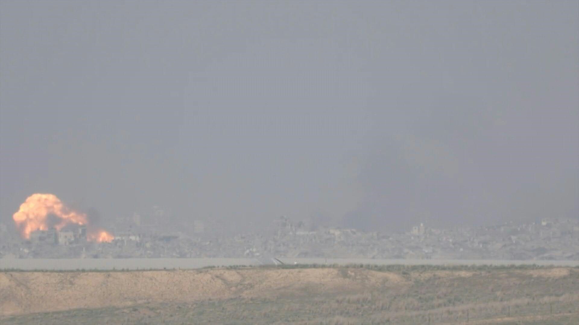 Smoke billows in Gaza after strikes, seen from Israel