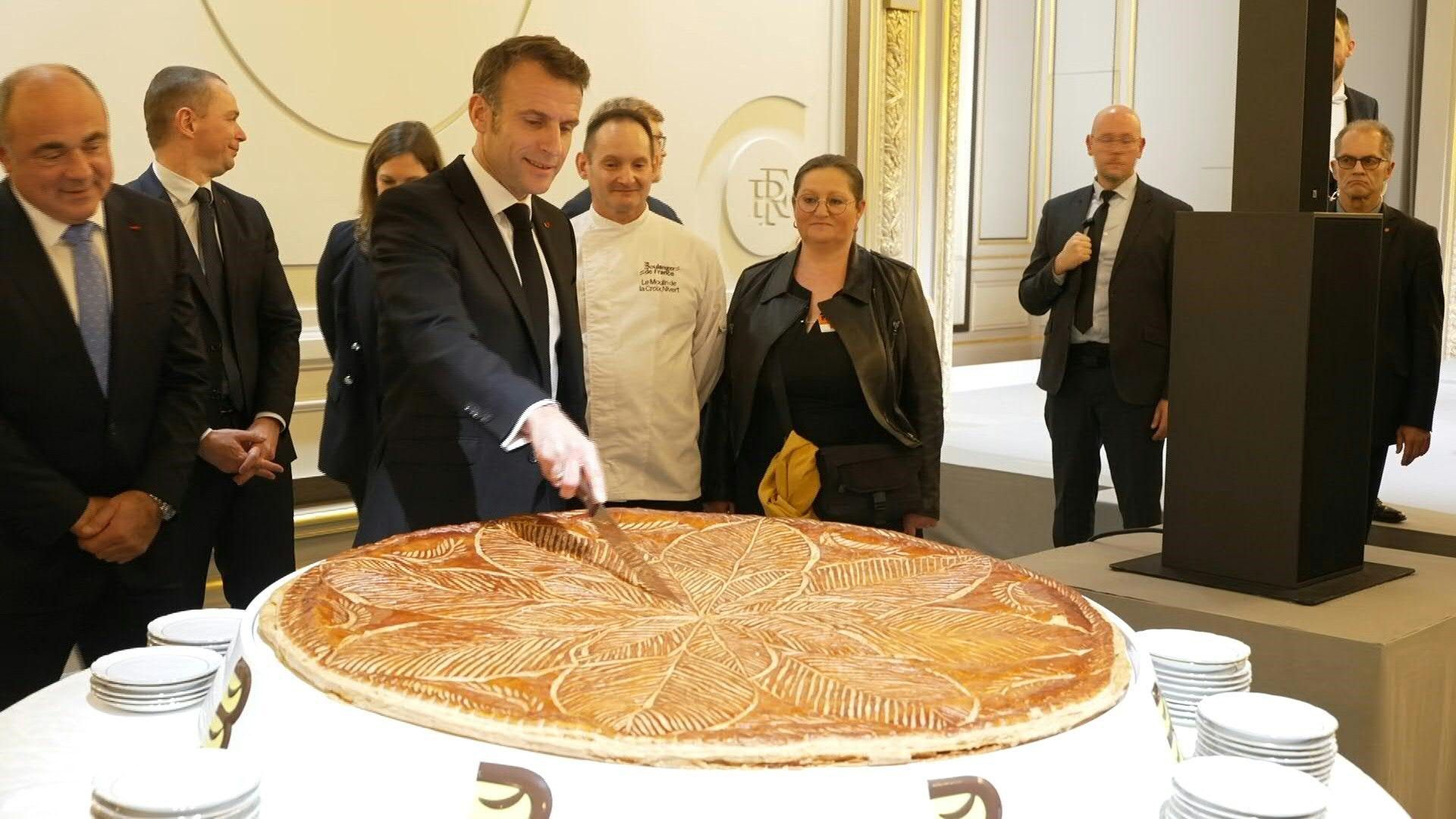 France's Macron serves traditional Epiphany cake at the Elysee Palace