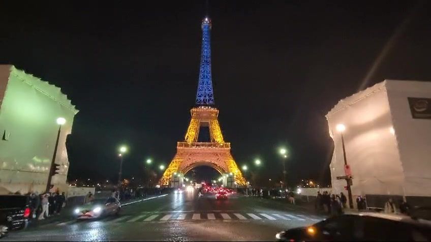 Eiffel Tower lights up in blue and yellow to mark second anniversary of Ukraine war