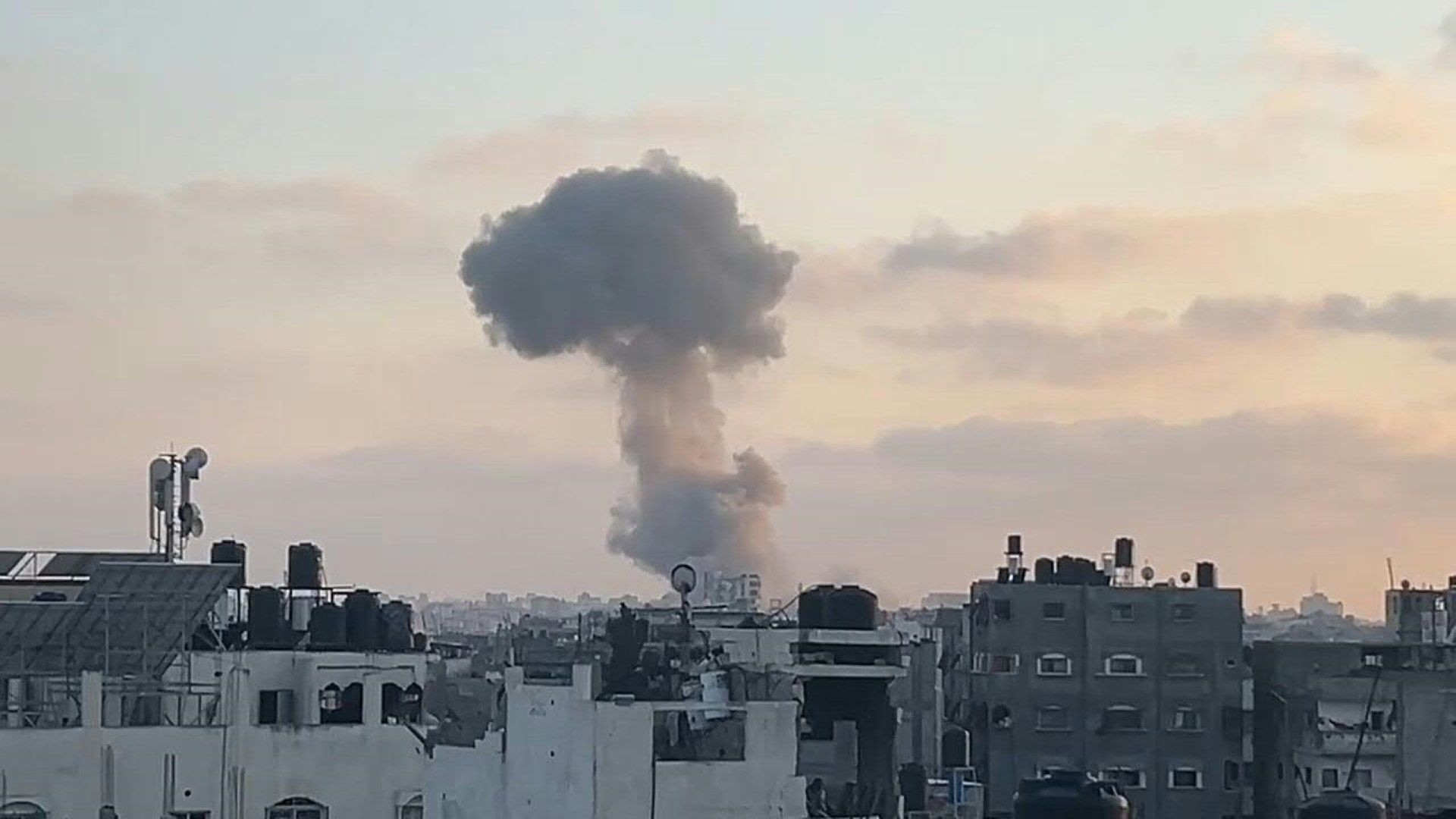 Large plumes of smoke rise over Gaza City