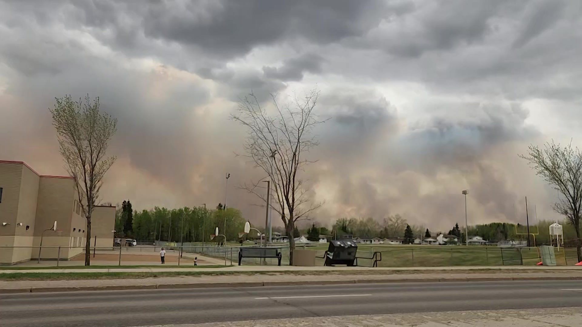 Queues of cars evacuate from Canada's Fort McMurray as wildfire menaces town  