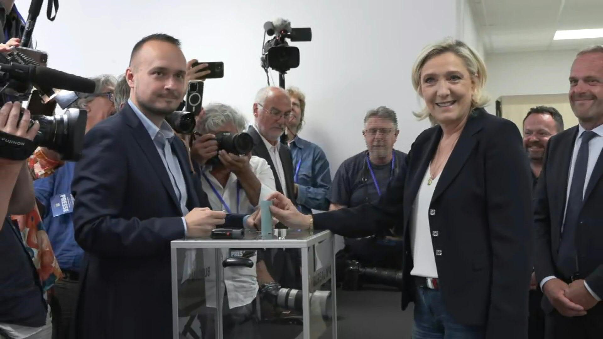 French far-right leader Marine Le Pen votes in the general elections