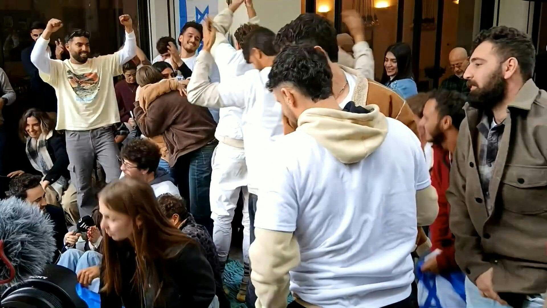 Friends of hostage Omer Wenkert celebrate his release
