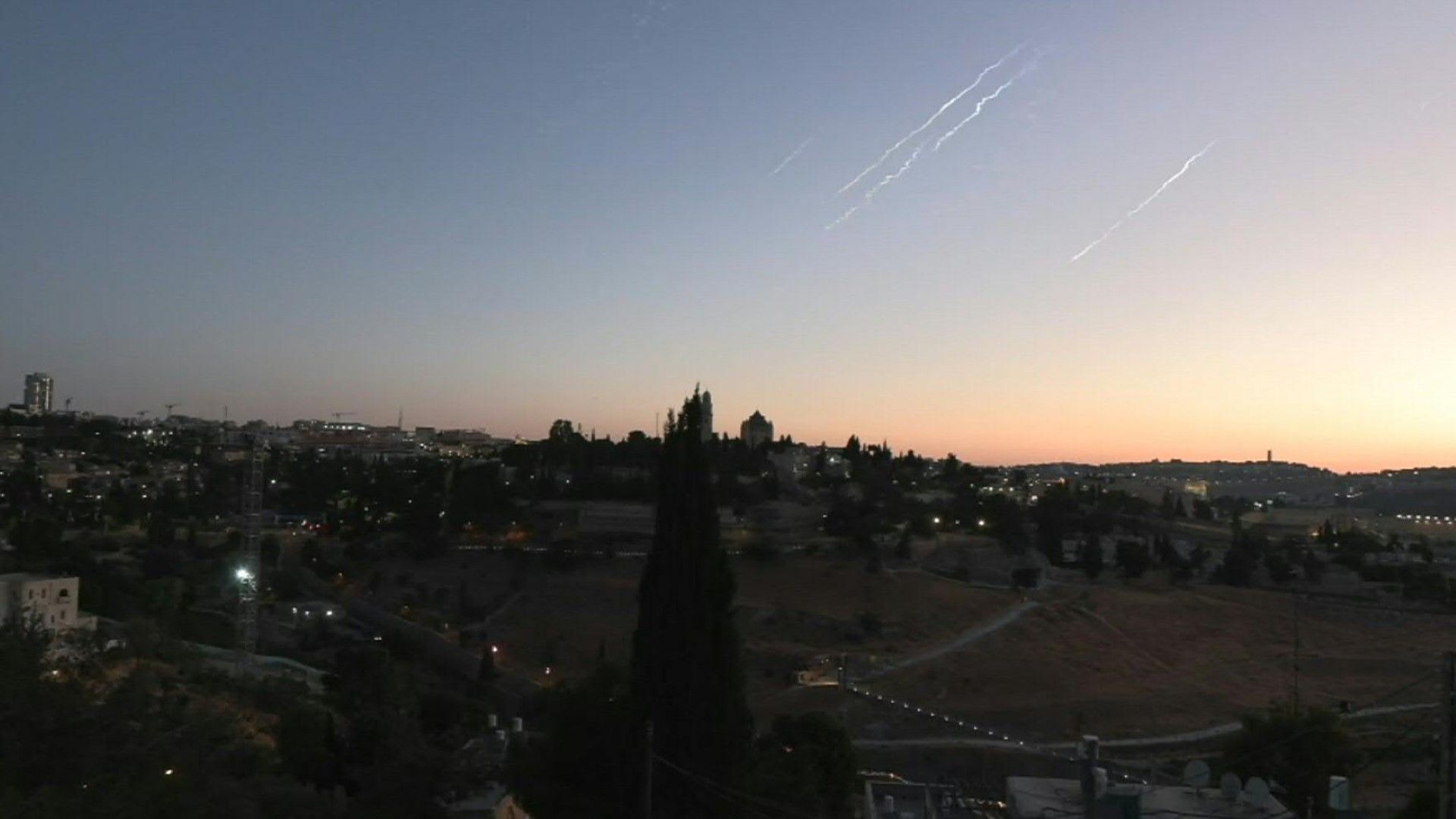 Smoke trails streak over Jerusalem as Iran fires more missiles