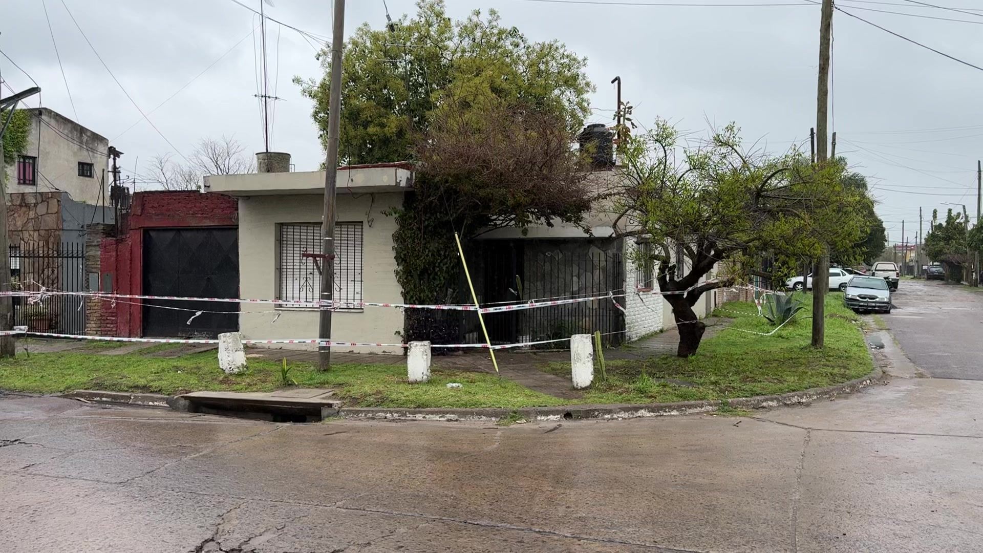 Police cordon outside house where the bodies of three Argentine women were found