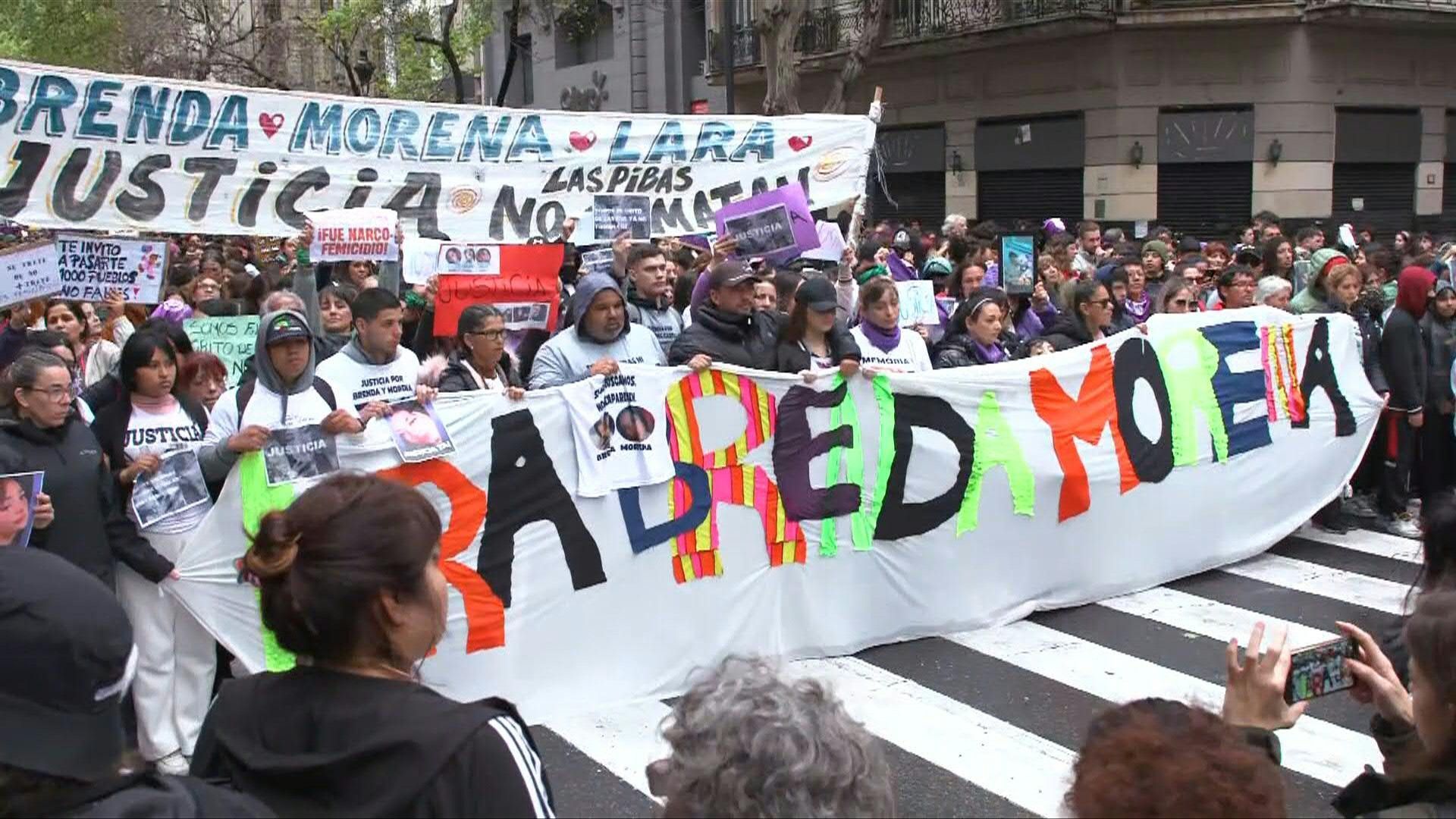 Thousands march in Buenos Aires demanding justice for victims of triple femicide