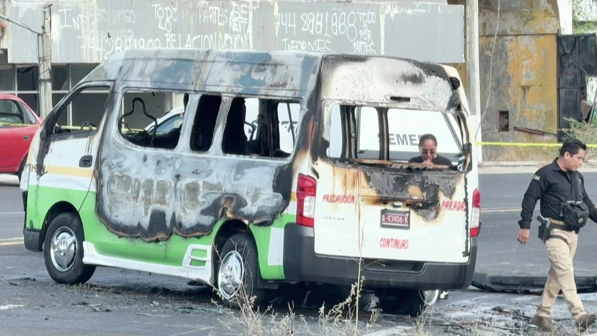 Video: Police and Mexican Army secure site where gunmen attacked and burned van