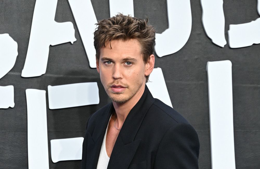 Austin Butler can't fit into his Celine trousers after bulking up his butt for Caught Steeling