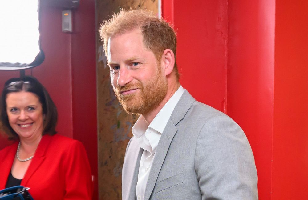 Prince Harry insists that he is not miserable