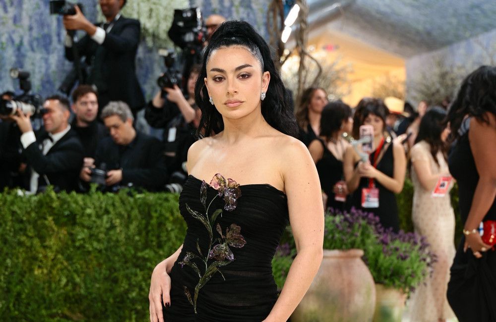 Charli xcx reveals believing in ghosts