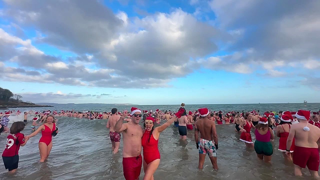 Hundreds brave the cold to make a splash for charity