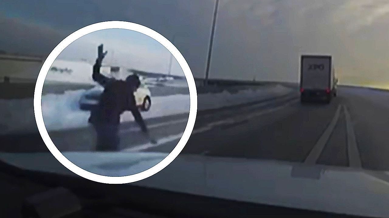 Video: Black ice sends officer sliding across icy highway in Indianapolis