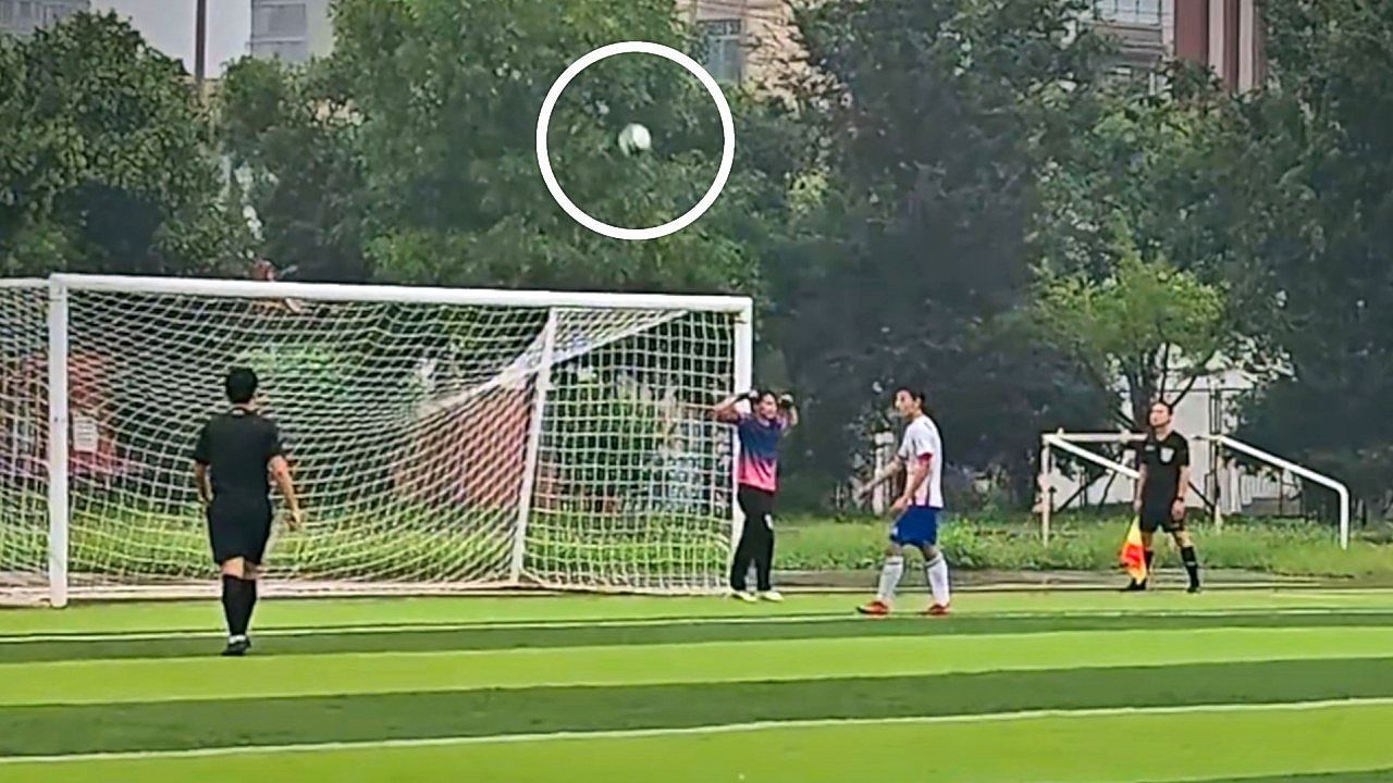 Goalkeeper celebrates too soon after penalty smashes off the crossbar